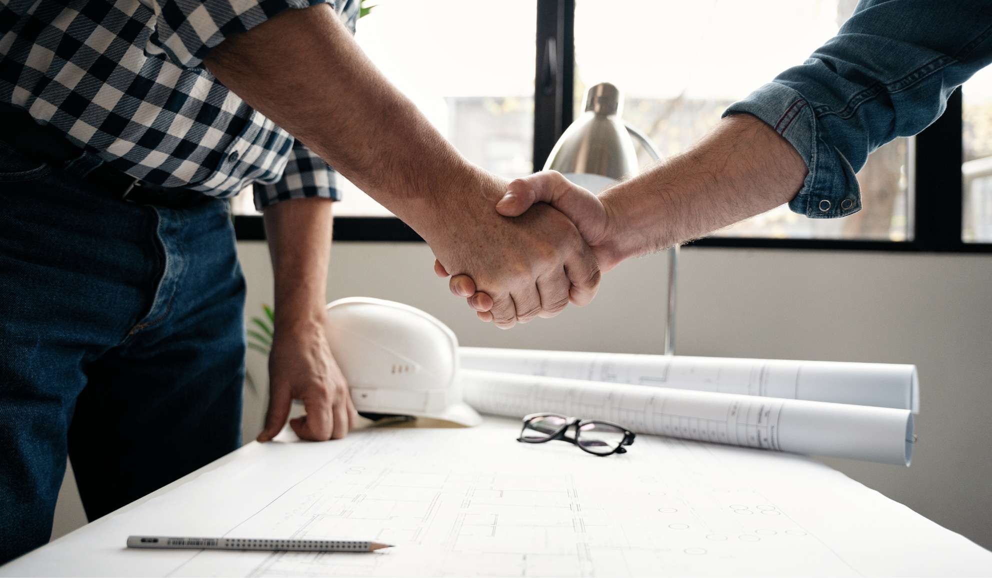 Two business men shaking hands